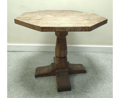 Robert "Mouseman" Thompson low oak occasional table, the octagonal top on faceted turned column and cruciform base, 72cm diam