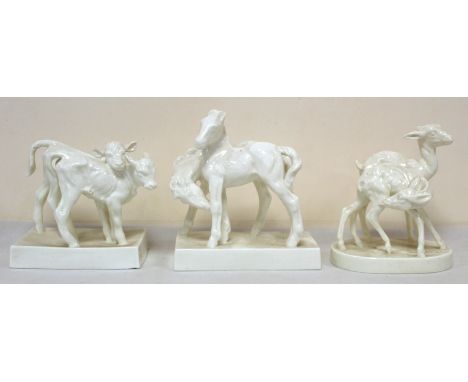 Three Royal Worcester white porcelain figure groups by Doris Lindener; "Calves", no. 3146, 7.5cm high, "Foals", no. 3152, 15c