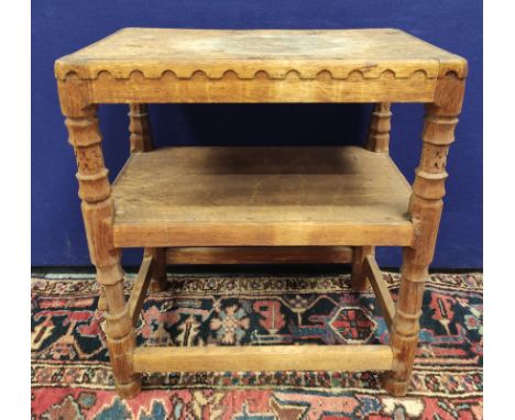 Robert "Mouseman" Thompson oak rectangular two tier occasional table with moulded frieze and carved faceted column supports o