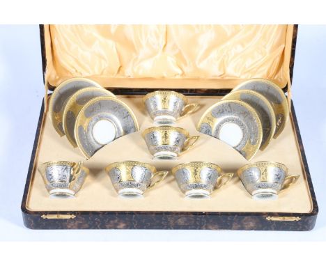 Schlaggenwald of Czechslovakian cased set of six tea cups and saucers with silver and gilt decoration in the Art Deco style, 