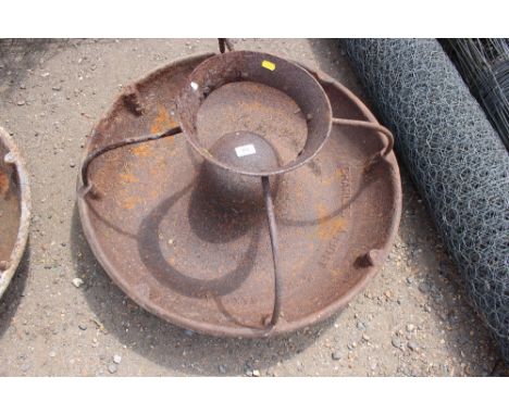 A cast iron pig trough 