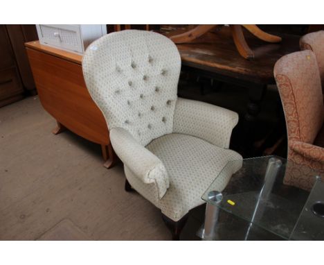 A button back upholstered nursing chair