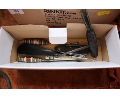 A box of button hooks; pen knives; cork screws etc.&nbsp;