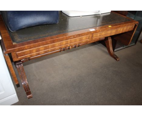 A leather topped sofa table