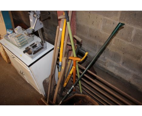 A quantity of long handled gardening tools 