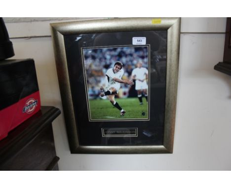 A framed picture of Johnny Wilkinson