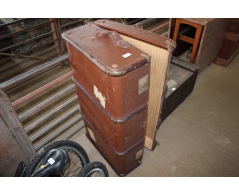 A wooden bound travelling trunk