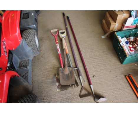 Two garden spades, a fork and two garden hoes