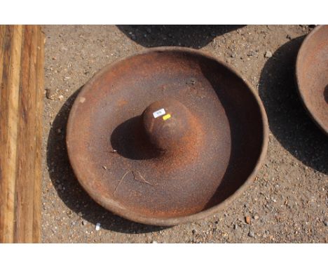 A cast iron pig trough 