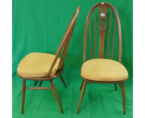 Pair of Ercol swan stick back dining chairs