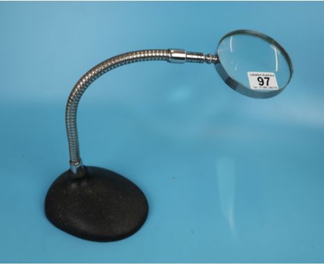 Vintage articulated magnifying glass on stand