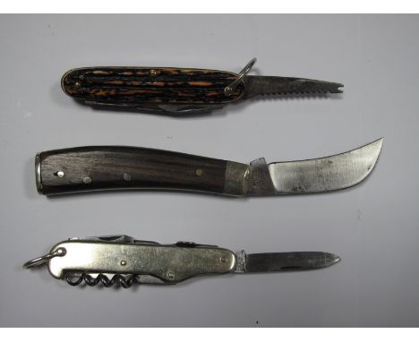 A. Wright & Son Ltd Sheffield Single Blade Pruning Knife, a multi blade folding knife; another with corkscrew.