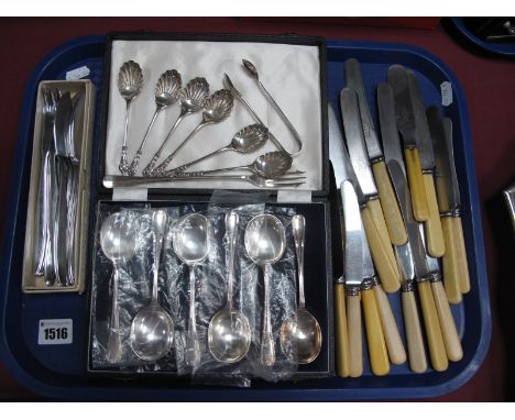 A Hallmarked Silver Pickle Fork; together with a decorative set of six apostle teaspoons with shell bowls, modernist fish kni