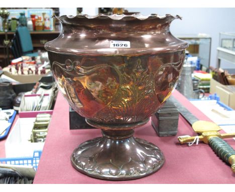 An Arts & Crafts Copper Pedestal Planter, with wavy rim, embossed foliage and heart shaped panels to body, 29cm high.