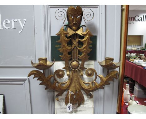 A XX Century Gilded Two Branch Wall Hanging Light, with mask and foliage, scroll decoration.