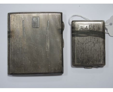 A Hallmarked Silver Cigarette Case, allover engine turned; together with a hallmarked silver match book case, allover engine 