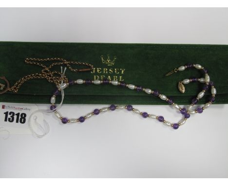 A Belcher Link Chain, suspending openwork "F" initial pendant; together with an amethyst and freshwater pearl  necklace. (2)