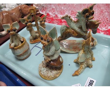 Yare Dragon Figures, designed by Sue Turner of Great Yarmouth, rocking horse (repaired), by lamp post, in barrel, on toadstoo
