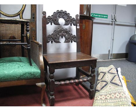 A XVIII Joined Oak Single Chair, with scroll carving to twin bar back, turned and block supports, united by bobbin stretcher.