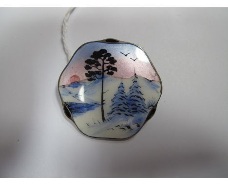 Norne; A Scandinavian Enamel Brooch, highlighted in pink, blue, white and black, depicting trees in a snowy landscape (damage