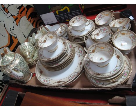 A Noritake Twelve Setting China Tea Service, gilt decoration and rose heads on a white and cream ground (thirty pieces) and a