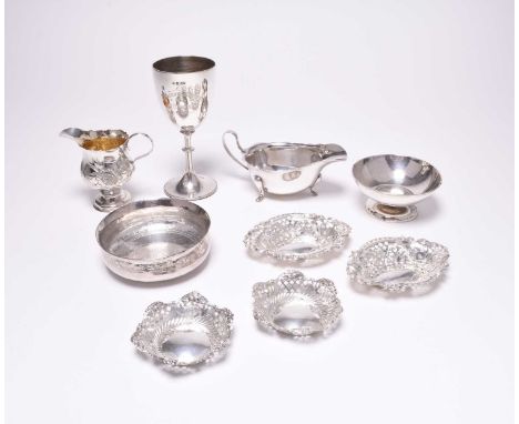 A small collection of silver, comprising; a George III silver baluster cream jug, London 1767, together with two pairs of pie