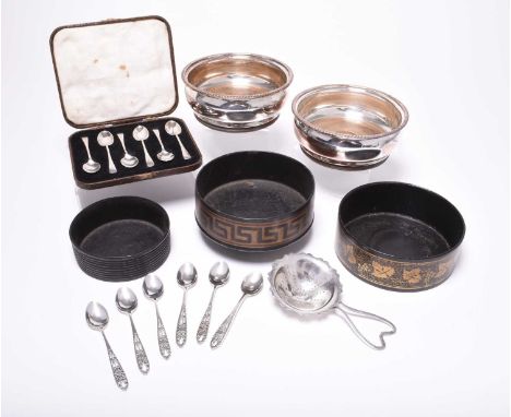 A cased set of six silver teaspoons, Sheffield 1927, together with a set of six white metal filigree teaspoons, stamped '80',