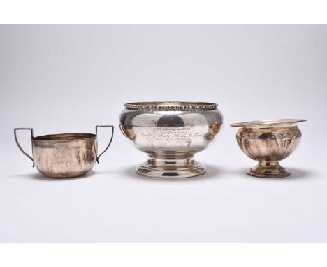 A silver presentation bowl, William Neale &amp; Son Ltd, Birmingham 1926, of circular form and raised on pedestal foot, 10.5c