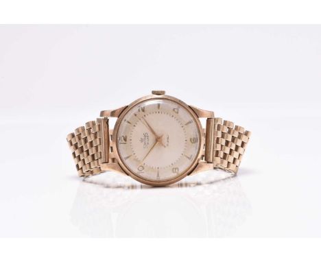 Smiths: A gentleman's 9ct gold bracelet watchModel: De LuxeDate: Circa 1954Movement: 17-jewel cal.27.CS manual windDial: Cham