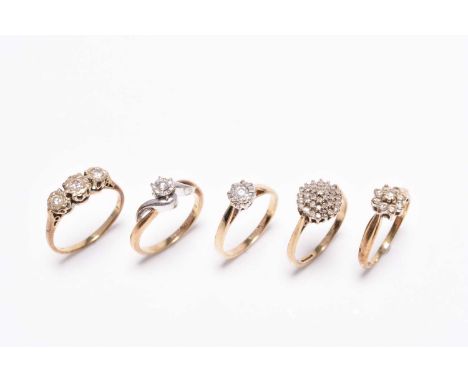 A 9ct gold single stone diamond ring, size L, together with a further 9ct gold single stone diamond ring, size K, two 9ct gol