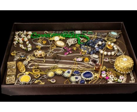 A Mixed Collection Of Costume Jewellery A varied lot to include gilt metal and crystal set circular trinket box, jadeite bead