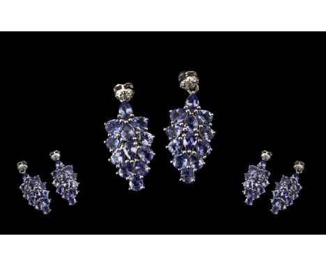 Tanzanite Cluster Drop Earrings, clusters of pear cut tanzanites, closely set in 'bunches of grapes' formation, totalling 3.5