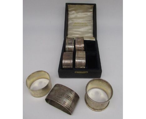 Four Geo.V hallmarked sterling silver napkin rings engraved with initial R, by John Rose, Birmingham, 1923, and three other G