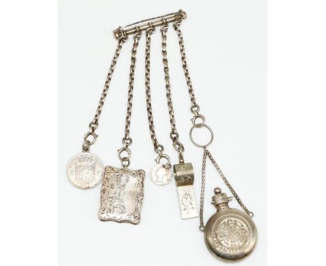 White metal chatelaine, with attached Victorian hallmarked Sterling silver vinaigrette, the central panel with river townscap