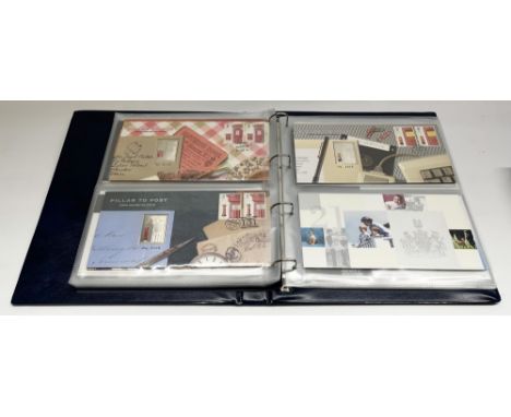 Folder containing Royal Mail / Royal Mint Philatelic-Numismatic First Day Covers, some with silver ingots 