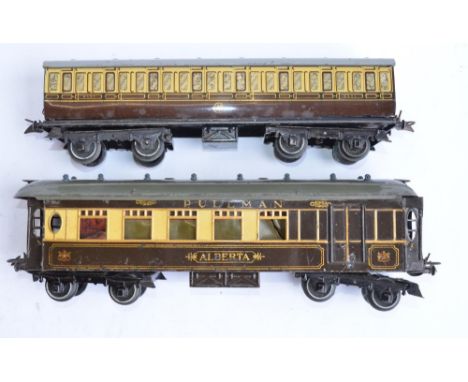 2 pre-war Meccano Hornby Series O gauge bogie railway coaches. A GWR 6597 First Class carriage (with original box) and a Pull