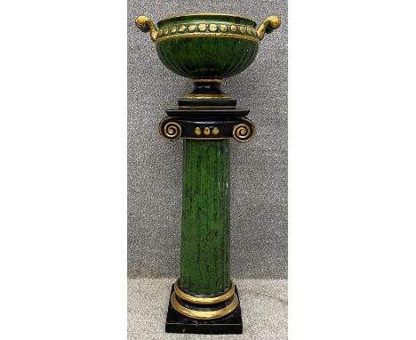 A contemporary ceramic jardiniere on stand with simulated green marbling and gilt embellishments with classical scroll and ur