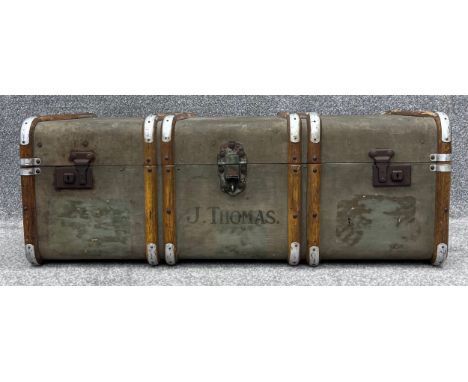 A vintage metal and beech bound steamer trunk. H.32 W.91 D.52cm