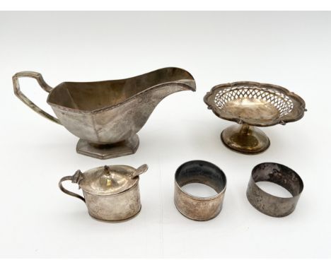 A miscellaneous collection of silver, English hallmarks. (One napkin ring unmarked and EPNS mustard spoon not included in wei