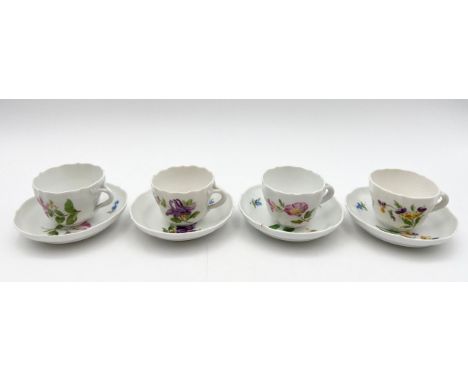 A set of four Meissen tea cups and saucers hand decorated with wild flowers. H.5 Dia.11cm.