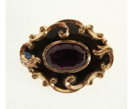 VICORIAN GOLD, BLACK ENAMEL AND PURPLE PASTE SET MEMORIAL BROOCH, with gold scroll edge, 2 1/8" (5.4cm) long, 27.4g