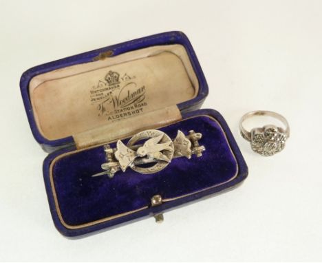 VICTORIAN SILVER BIRD BAR BROOCH, Birmingham 1876, AND A SILVER AND MARCASITE SET FLOWER PATTERN RING (2)