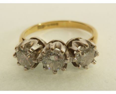 AN 18CT GOLD THREE STONE DIAMOND RING, each claw set diamond 0.40ct approx., Birmingham, 4.2g