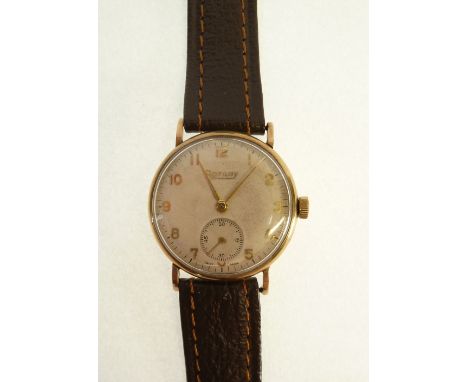 GENTS ROTARY, 9CT GOLD CASED WRIST WATCH, 15 jewel movement, silvered arabic dial with subsidiary seconds, on brown leather s