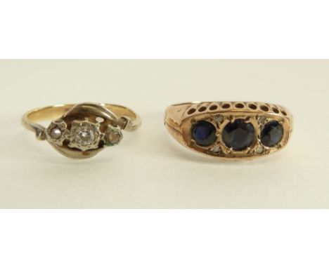 A 9CT GOLD THREE STONE SAPPHIRE RING, with four melee diamonds, Birmingham 1979, AND A STAMPED 9CT GOLD THREE STONE DIAMOND R