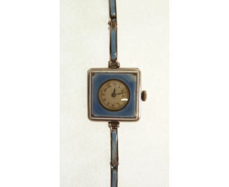 A LADY'S SILVER AND BLUE GUILLOCHE ENAMEL WATCH, mechanical movement, with enamelled square case and circular silvered Arabic