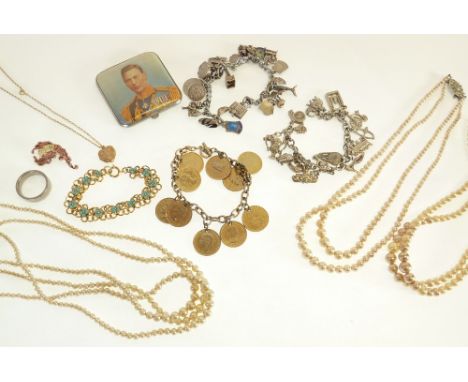 A METAL CHARM BRACELET, WITH TWENTY FOUR SILVER AND METAL CHARMS, ANOTHER METAL CHARM BRACELET, WITH METAL CHAMS, A GILT COIN