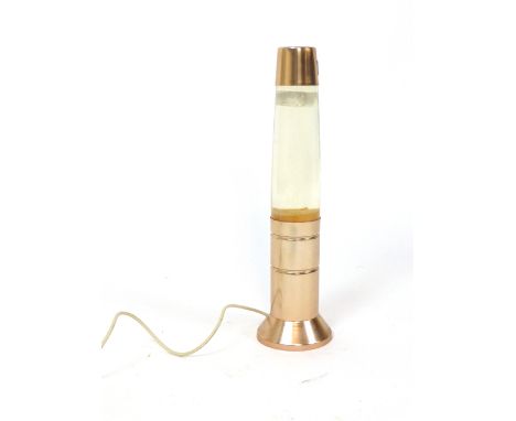 A 1950's copper clad lava lamp, h. 45 cm CONDITION REPORT: Sold as a collectors piece and will require re-wiring before use.