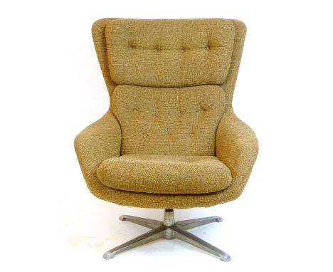 A 1960/70's 'Egg'-type Parker Knoll button upholstered armchair on an aluminium five star base CONDITION REPORT: Pitting to b