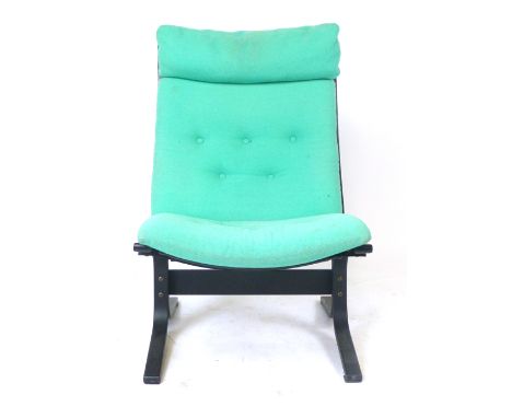 Ingmar Relling for Westnofa, a 'Siesta' chair, the stained beech frame with loose button upholstered cushions CONDITION REPOR